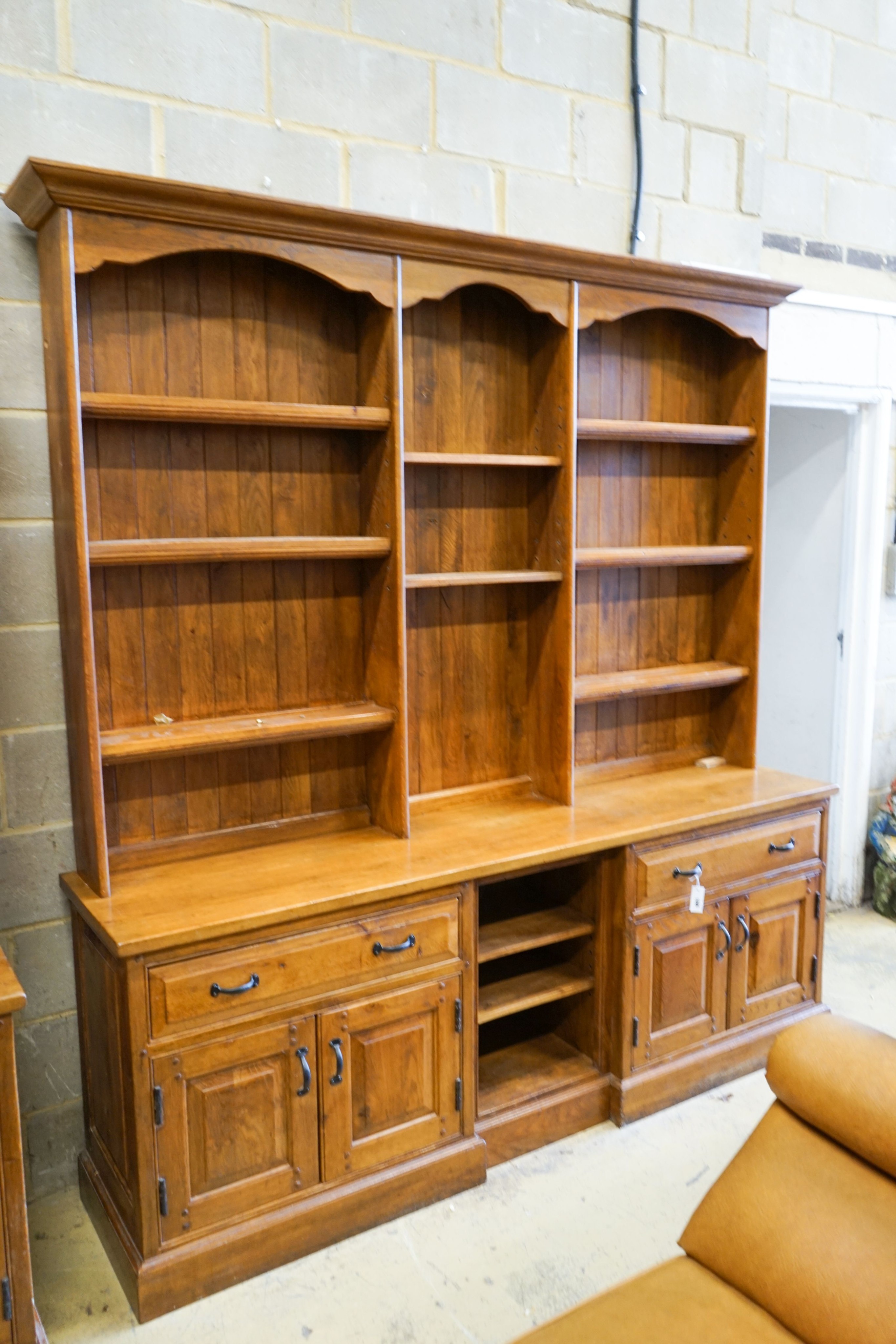 A large reproduction oak dresser, length 210cm, depth 48cm, height 225cm